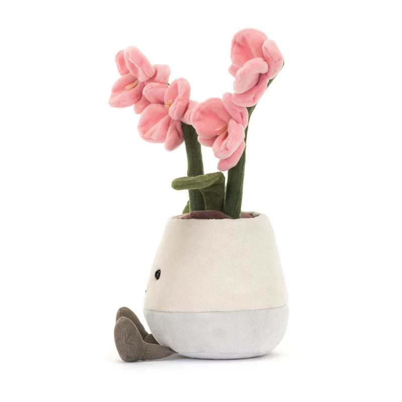 Side view of the Jellycat Amuseable Pink Orchid, showing its delicate pink flowers, green stalks, and cocoa soil nestled in a two-tone pot.