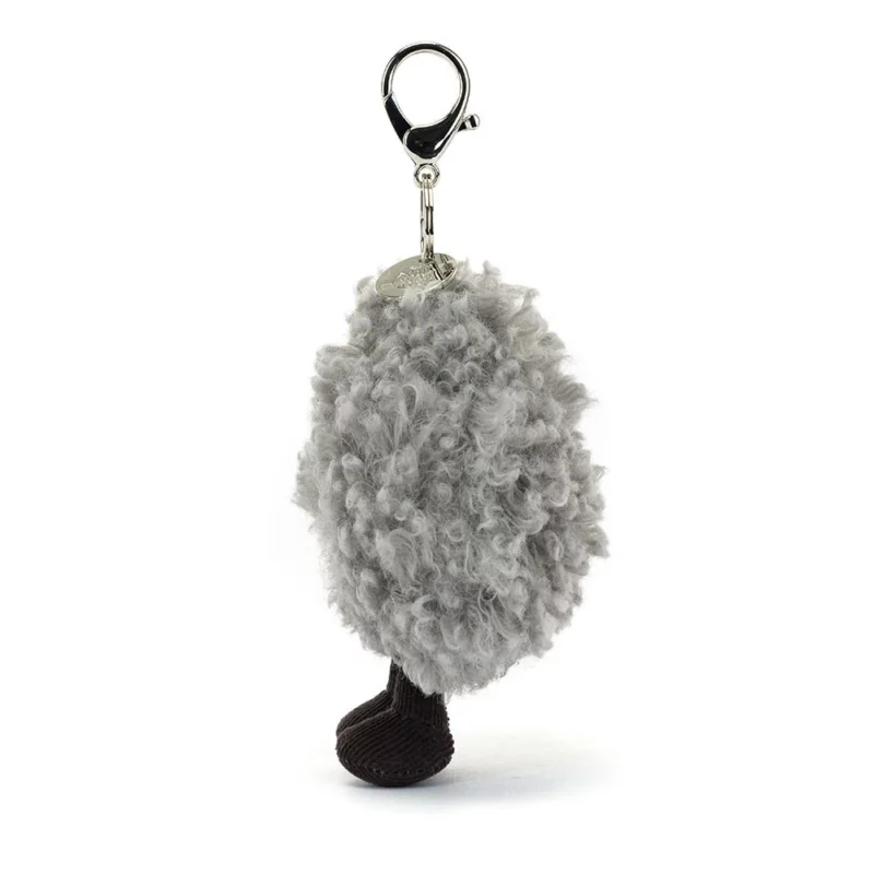 Side view of the Jellycat Amuseable Storm Cloud Bag Charm, showing the textured grey plush fur, silver clip, and fine cord boots.