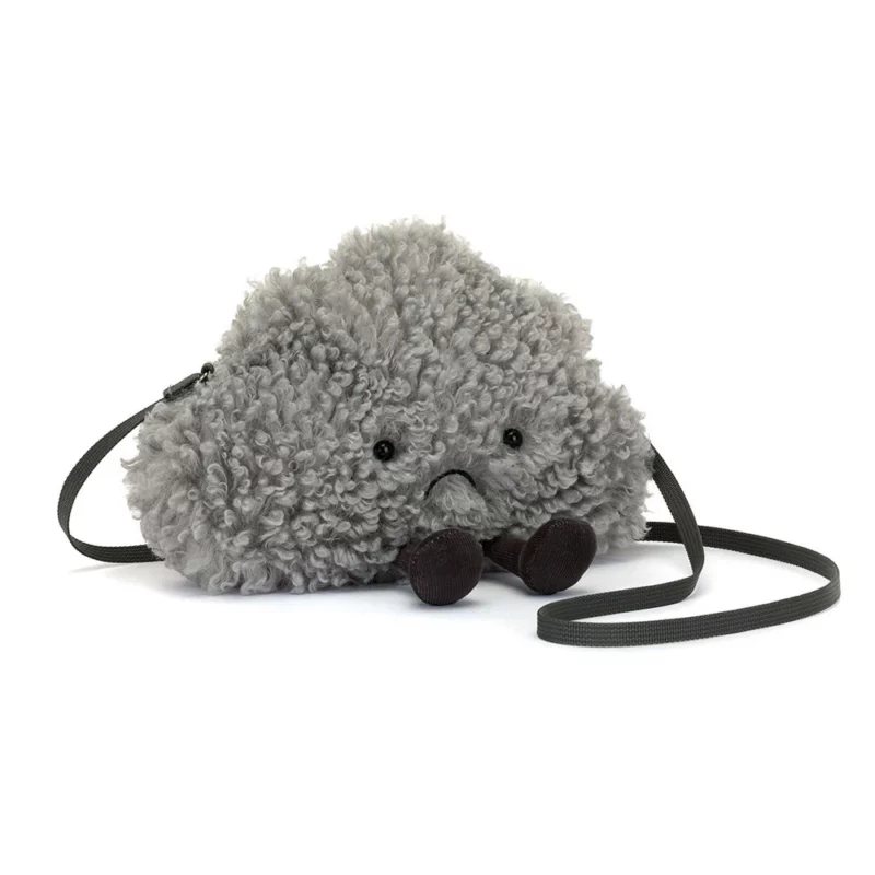 Front view of the Jellycat Amuseable Storm Cloud Bag, showcasing its textured grey fur, stitched frown, and fine cord boots with a long shoulder strap.