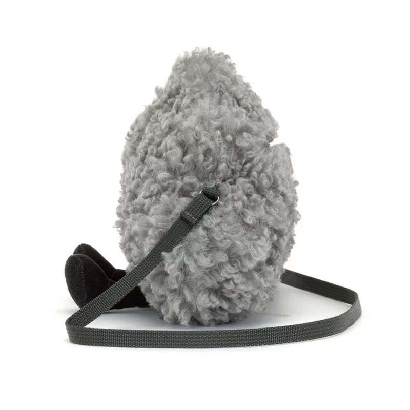 Side view of the Jellycat Amuseable Storm Cloud Bag, highlighting its fluffy textured fur, hidden zip closure, and strap attachment.