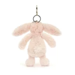 Rear view of the Jellycat Bashful Blush Bunny Bag Charm, highlighting the bunny's fluffy tail and soft pink fur, with the silver clasp attachment.