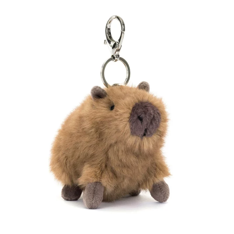 Front view of the Jellycat Clyde Capybara Bag Charm, showcasing its soft, two-toned fur, small suedette snout, and brown claws.
