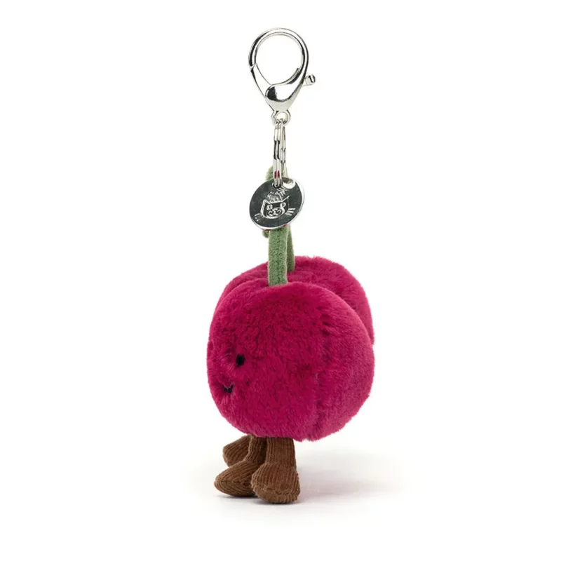 Side view of the Jellycat Amuseable Cherries Bag Charm, showcasing the depth of the plush cherries and the way they dangle from the soft green stem.
