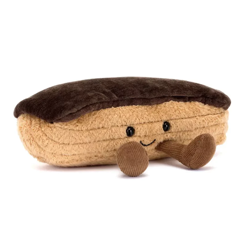 Front view of the Jellycat Amuseable Étienne Eclaire, showcasing its golden pastry body, rich chocolate icing top, and adorable stitched smile.