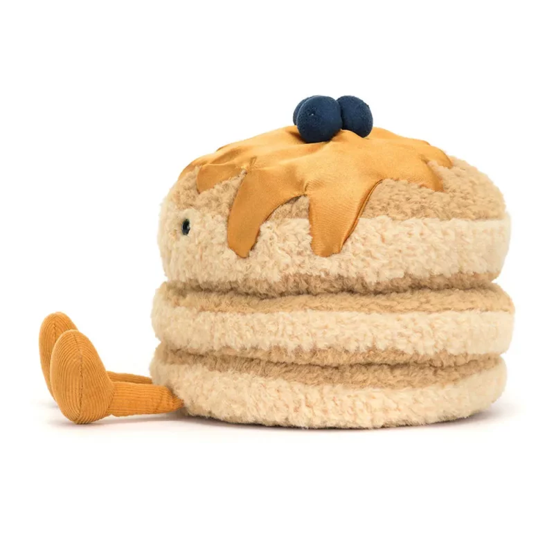 Side view of the Jellycat Amuseable Fran Pancakes, highlighting the layered pancake stack, soft syrup details, and fine cord legs.