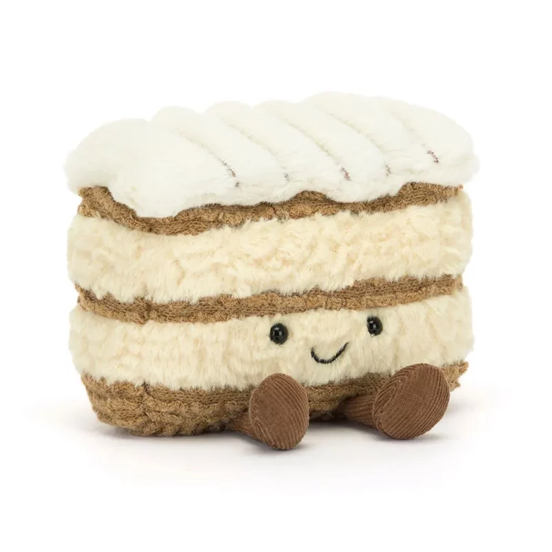 Front view of the Jellycat Amuseable Milie Mille Feuille, showcasing its layered pastry design, fluffy crème pâtissière filling, and striped icing top.