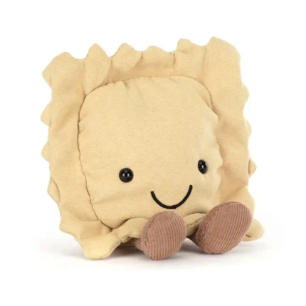 Front view of the Jellycat Amuseable Ravioli, highlighting its golden plush fabric, wavy stitched edges, and cheerful embroidered smile.