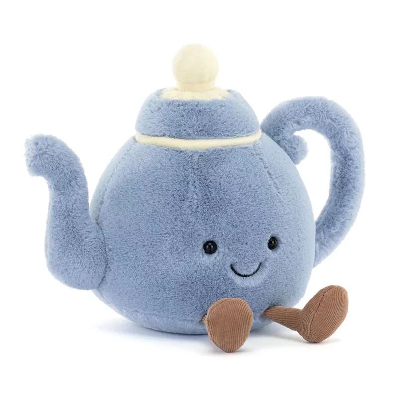 Front view of the Jellycat Amuseable Vicky Teapot, showcasing its soft blue fur, cream lid accents, and cheerful stitched smile.