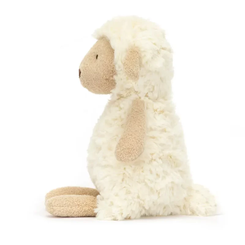 Side view of the Jellycat Lollie Lamb, highlighting its plush woolly body and adorable profile.