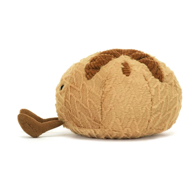 Side view of the Jellycat Amuseable Sourdough, showing textured beige and brown fur.