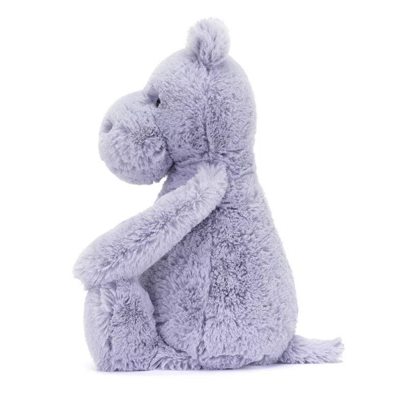 Side view of the Jellycat Bashful Hippo, showing its long limbs, stubby tail, and velvety lilac texture.