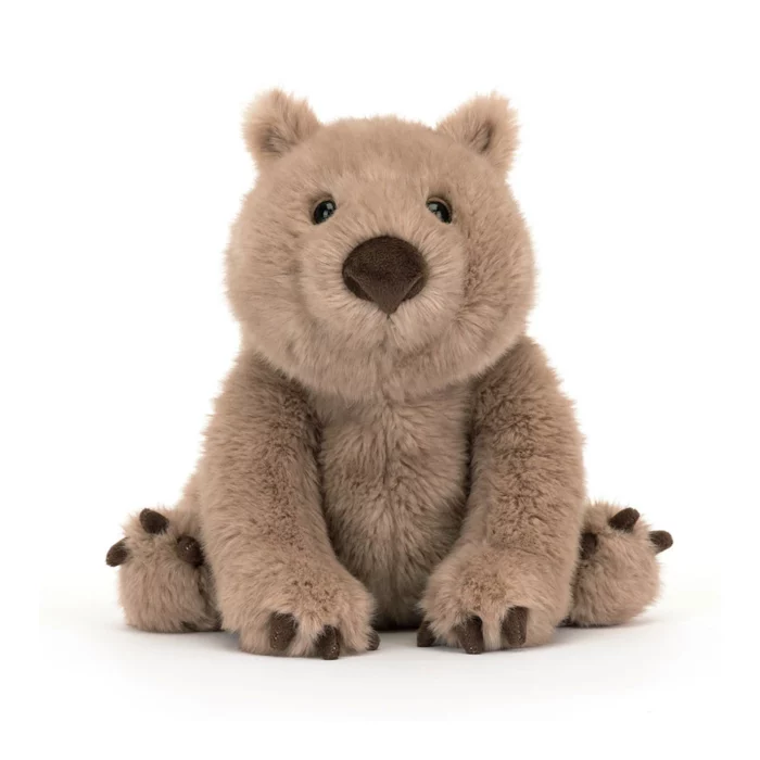Alternative front view of the Jellycat Wonda Wombat with a sweet expression and two-tone fur detailing.