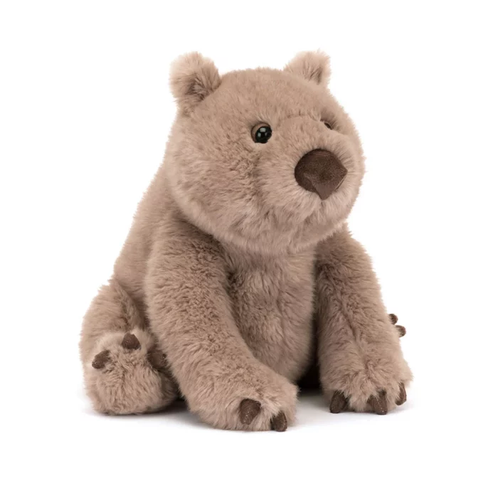 Front view of the Jellycat Wonda Wombat with a large suede-like nose and soft brown fur.