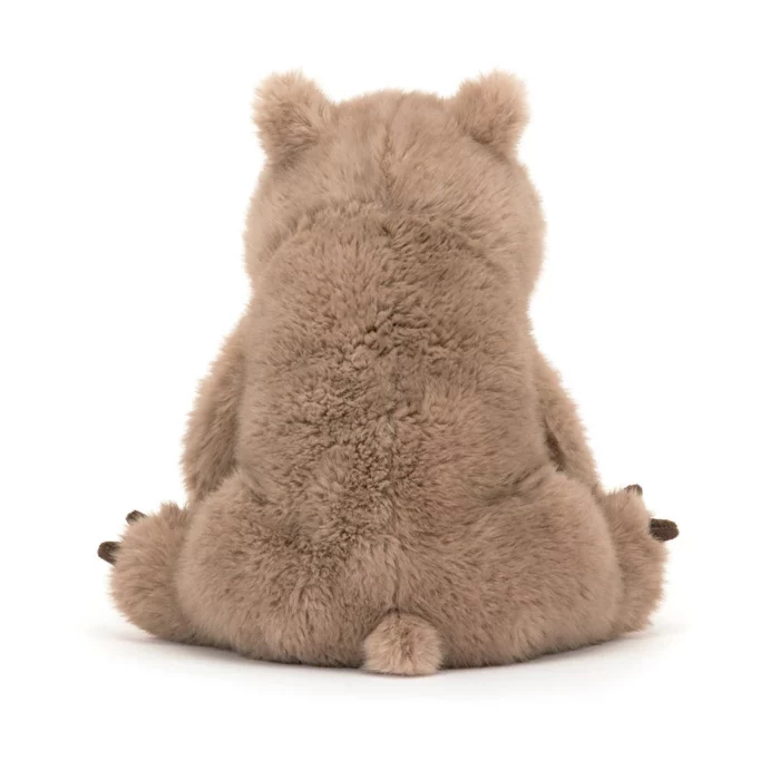 Rear view of the Jellycat Wonda Wombat, highlighting its bobtail and cuddly back.
