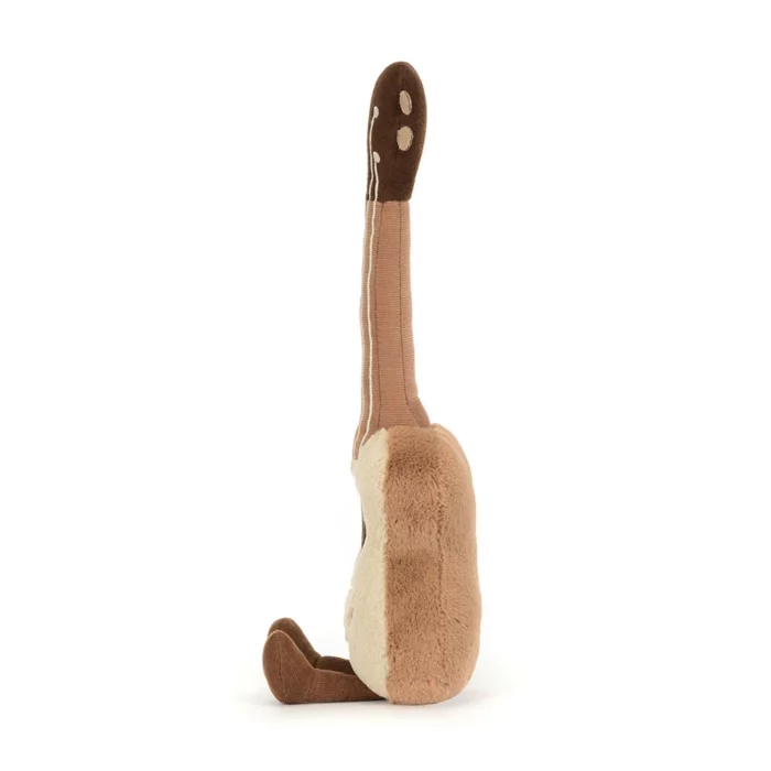 Side view of the Jellycat Amuseable Ukulele revealing its brown plush back and stitched details.