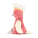 Side view of the Jellycat Squawkatoo highlighting her curved beak, colourful crest, and long tail.