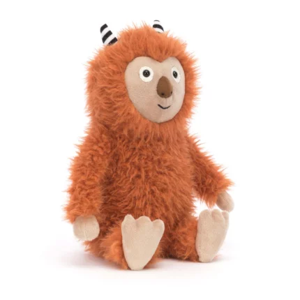 Front view of Jellycat Pip Monster sitting upright with fuzzy ginger fur and beige features.