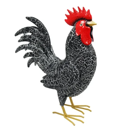 Front view of the Black Cockerel Metal Garden Ornament showing its crackled black finish, red comb, and curved tail feathers.