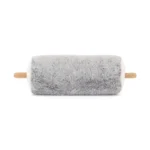 Rear view of Jellycat Amuseable Goat Cheese highlighting its soft fluffy grey finish and wooden ‘stick’ detail.