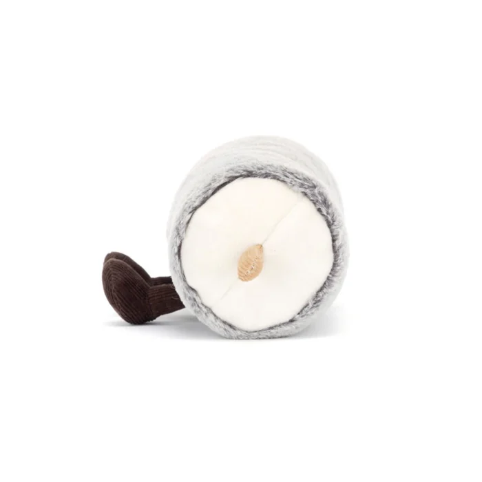 Side view of Jellycat Amuseable Goat Cheese displaying its round cheese shape and textured detailing.