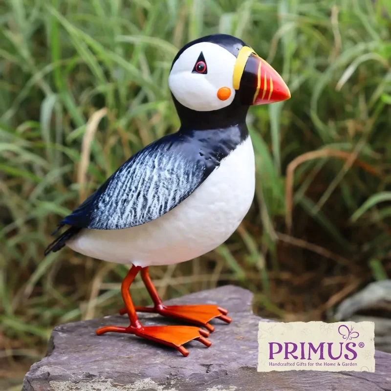 Handcrafted metal garden ornaments including colourful bird sculptures for outdoor décor.