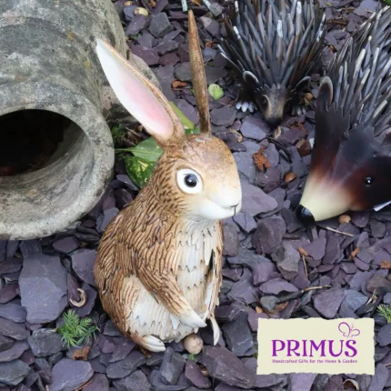 Rabbit Metal Garden Ornament displayed on slate chippings next to other woodland figures.
