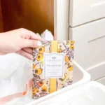 Greenleaf Harvest Gold Scented Sachet displayed in a drawer with linens.