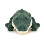 Alternative front view of Jellycat Allexi Alligator, with a wide snout, bright eyes, and charming smile full of plushy teeth.