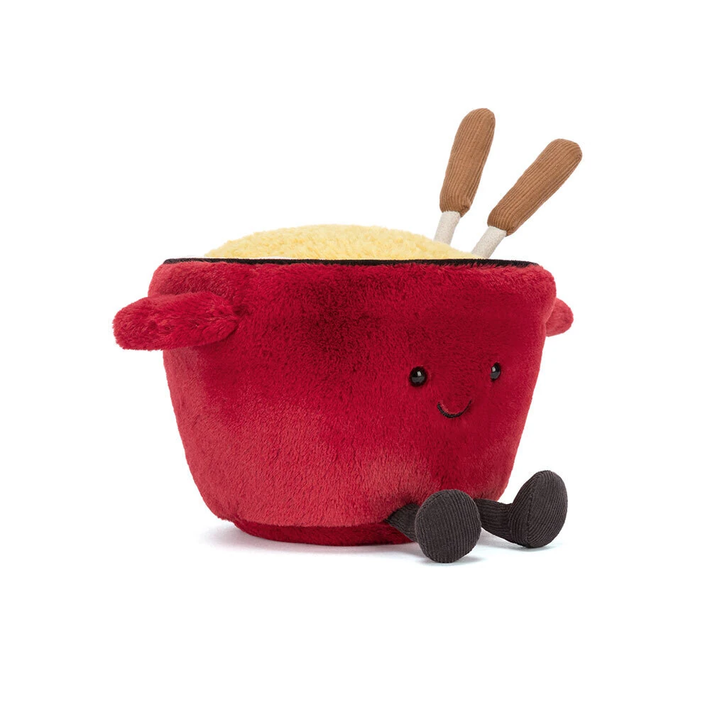 jellycat-amuseable-cheese-fondue-front Front view of Jellycat Amuseable Cheese Fondue, showing its red plush fondue pot, golden cheese filling, fondue forks, and stitched smiling face.