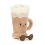 Front view of Jellycat Amuseable Latte, showing a smiling plush coffee cup topped with soft white whipped cream and complete with cordy brown legs.
