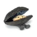 Front view of Jellycat Amuseable Michelle Mussel, showing a smiling mussel nestled in a charcoal grey plush shell with cordy feet.