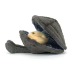 Side view of Jellycat Amuseable Michelle Mussel, revealing the soft curve of the shell and the golden mussel face peeking out.