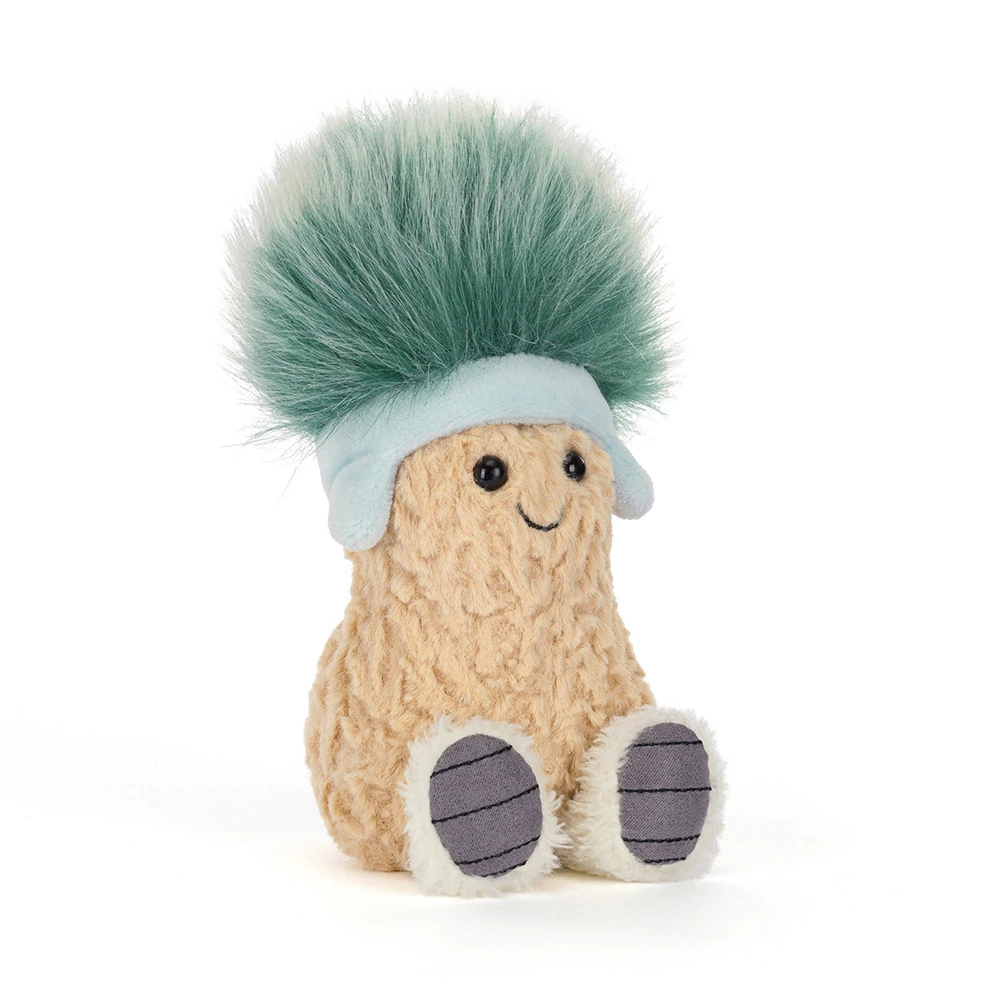 jellycat-amuseable-peanut-apres-ski-front Front view of Jellycat Amuseable Peanut 'Après Ski', showcasing its textured peanut body, smiling face, and fluffy green hat.