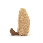 Side view of Jellycat Amuseable Philippe Palmier, highlighting the fluffy, textured surface and upright pastry shape.