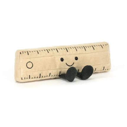 Front view of Jellycat Amuseable Ruler, a soft tan corduroy plush with stitched markings, a happy smile, and charcoal cordy legs.