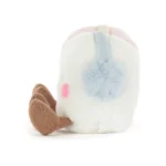Side view of Jellycat Amuseable Toastie Pink and White Marshmallows, highlighting the pale blue earmuff and corduroy brown feet.