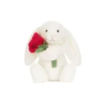 Alternative front view of Jellycat Bashful Cream Bunny with Rose, clearly displaying the vibrant rose and her soft cream-coloured fur.
