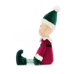 Side view of Jellycat Eldo Elf, showing the plush profile, pointy ears, and striped green-and-white tights.