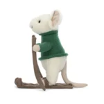 Side view of Jellycat Merry Mouse Skiing, highlighting his upright ears, cosy knitted jumper, and fabric skis and poles.