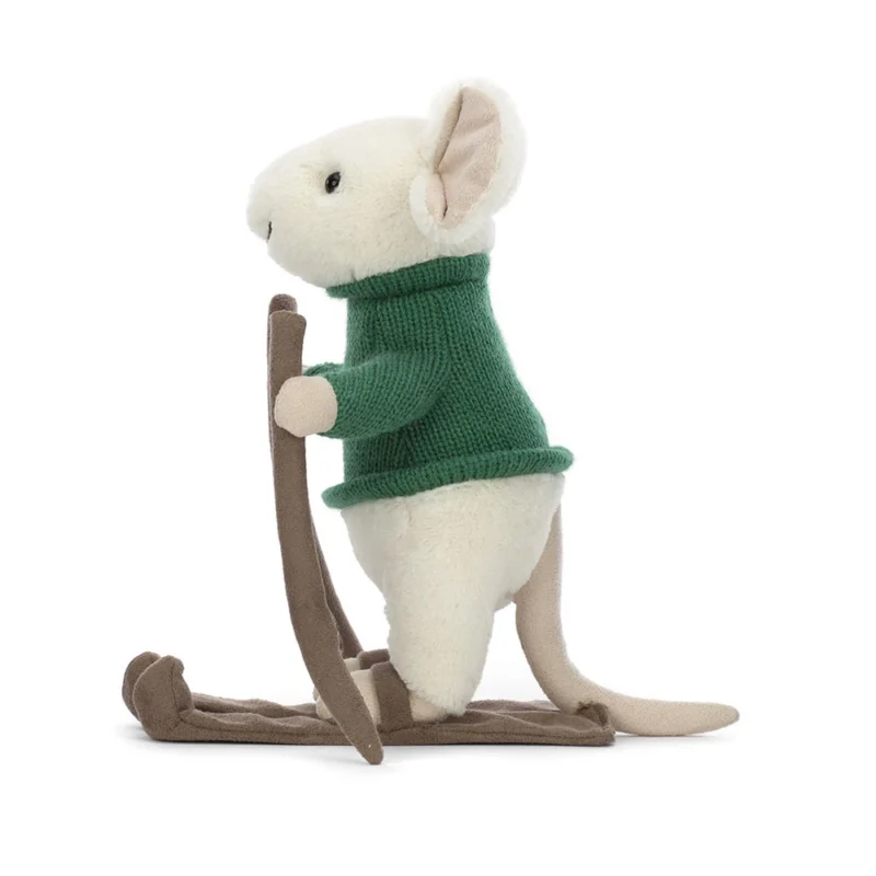 Side view of Jellycat Merry Mouse Skiing, highlighting his upright ears, cosy knitted jumper, and fabric skis and poles.