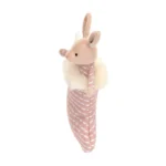 Side view of Jellycat Shimmer Stocking Bunny, highlighting the plush bunny's head and ears poking from the stocking’s white faux fur edge.