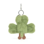 Rear view of Jellycat Amuseable Siofra Shamrock Bag Charm showing the back of the plush clover design and fluffy tail.