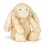 Front view of Jellycat Bashful Springlowe Luxe Bunny with soft mottled beige fur, floppy ears, and a stitched pink nose.