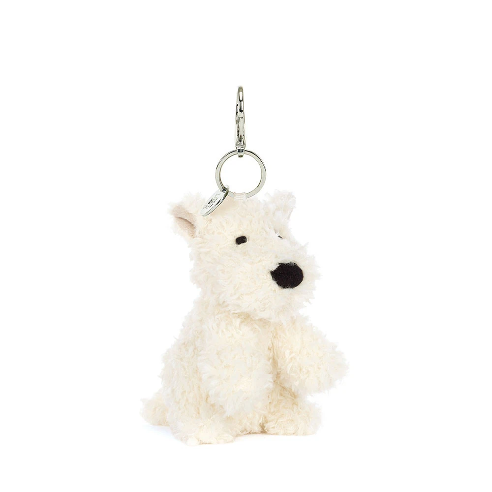 jellycat-munro-scottie-dog-bag-charm-front Front view of the Jellycat Munro Scottie Dog Bag Charm, featuring soft cream fur, a black nose, and a silver keyring with Jellycat tag.