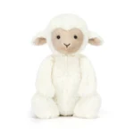 Alternative front view of Jellycat Skipson Lamb with seated pose and sweet stitched smile.