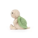 Side view of Jellycat Thimble Turtle displaying rounded green shell and soft flippers.