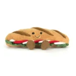 Alternative front view of Jellycat Amuseable Caprese Baguette featuring smiling face, green leaves and cordy legs.