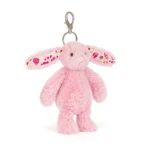 Front view of Jellycat Blossom Blushkin Bunny Bag Charm with soft pink fur, floral patterned ears and silver clasp attachment.
