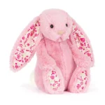 Front view of Jellycat Blossom Blushkin Luxe Bunny Original with soft pink fur, floral patterned ears and matching rose print paw pads.