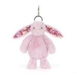 Alternative front view of Jellycat Blossom Thistlepop Bunny Bag Charm featuring floral ears, velvety pastel purple fur and silver clasp.